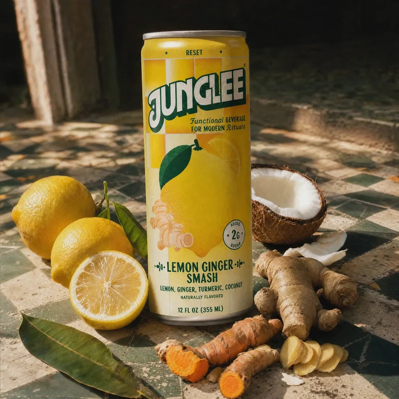 Lemon Ginger Smash 12 oz can with lemon, ginger, turmeric & coconut on sunlit green tiles