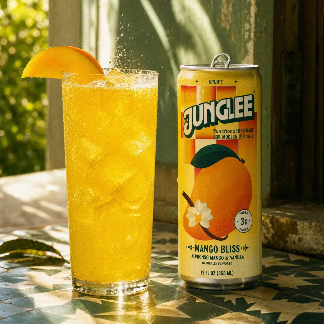 Mango Bliss beside a freshly poured golden mango drink