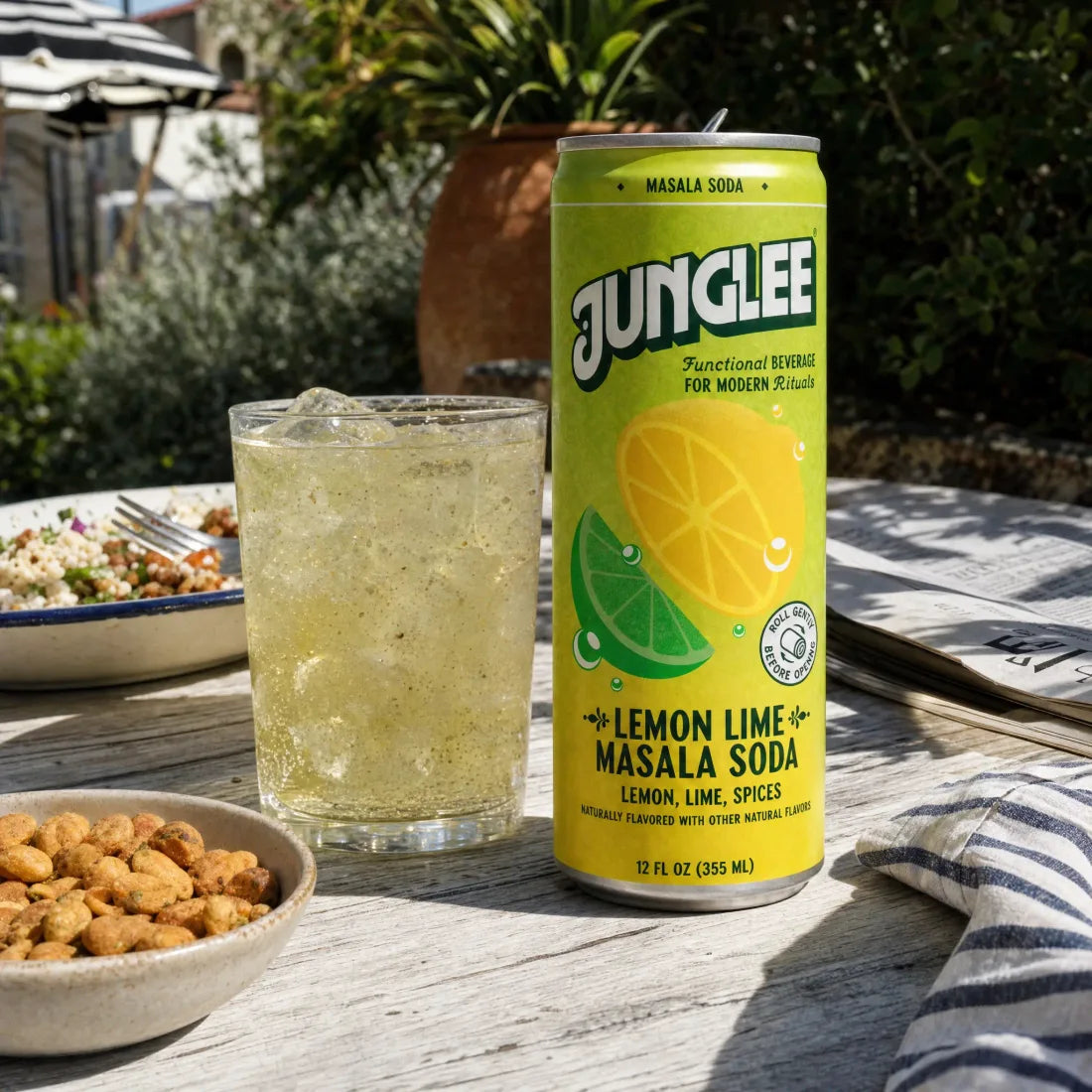 Lemon Lime Masala Soda served with a meal on a sunlit patio